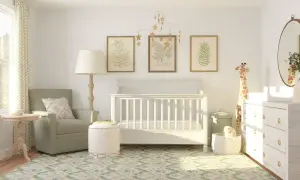 Serene nursery with a white crib, botanical art, and a giraffe plush. Great crib decoration ideas for a calm, nature-inspired room.