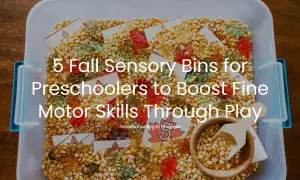 A fall sensory bin filled with corn kernels, colorful leaf cutouts, and tongs. This bin is perfect for preschoolers to explore and develop fine motor skills.