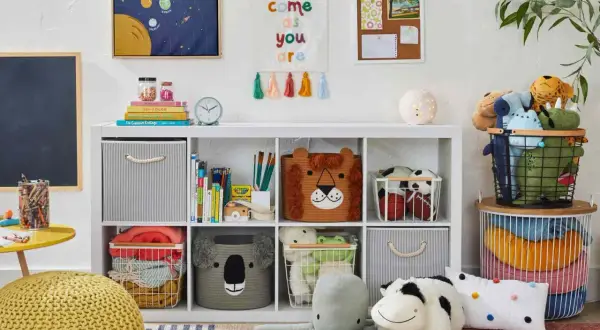 A bright, organized toy room with animal-themed baskets, plush toys, and colorful decor. This space offers great toy room inspiration for keeping things tidy and fun.