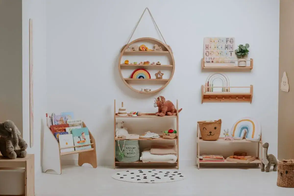Montessori-inspired nursery with wooden shelves filled with toys and books, perfect for an 8-month-old's development.