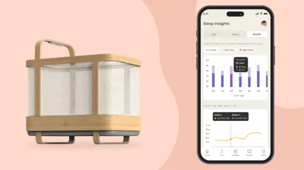 A modern 4 in 1 crib with a phone displaying sleep insights, showing a baby's sleep patterns over time.