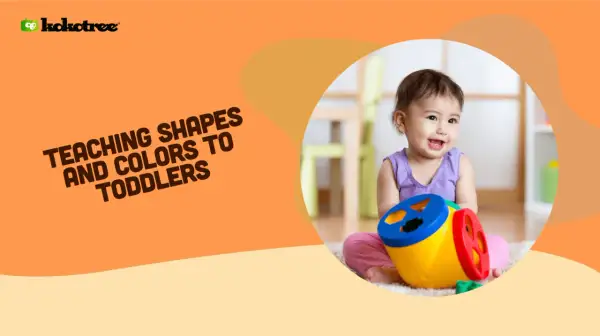 A happy toddler plays with a colorful shape sorter, learning shapes and colors.